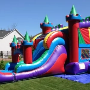 multi color castle bounce house with slide